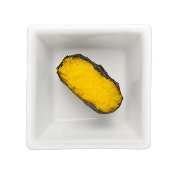 Sushi - Yuzu tobiko gunkan in a square bowl isolated on white background