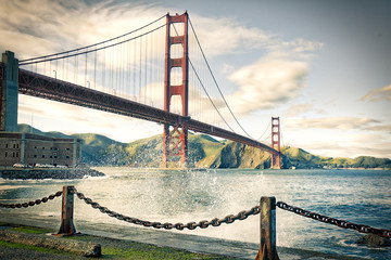 San Francisco's landmark Golden Gate Bridge from Fort Point - Powered by Adobe