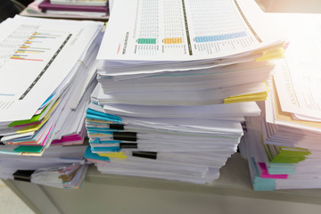 Pile of unfinished documents on office desk, Stack of business paper