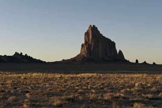 Shiprock, New Mexico.Shiprock (Navajo: Ts&eacute; Bitʼaʼ&iacute;, "rock with wings" or "winged rock") 482.5 m above the plain on the Navajo Nation, New Mexico, USA.