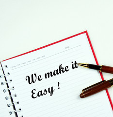 We make it Easy !  on note book with pen