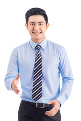 Happy smiling young asian man show thumb isolated on white background.