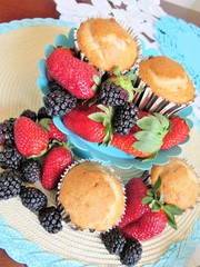 Fresh baked muffins with blueberries and strawberries