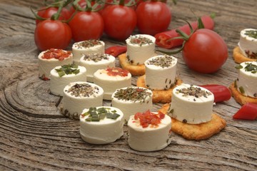 Greek feta cheese pieces on wooden background