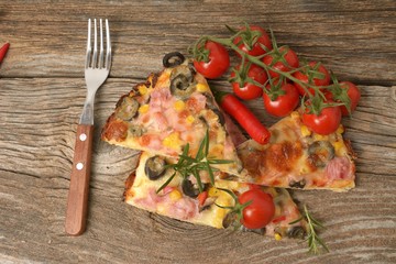 Delicious italian pizza served on wooden table