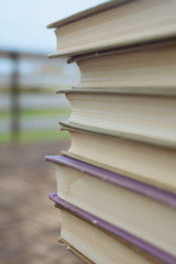 Stack old books, extreme closeup