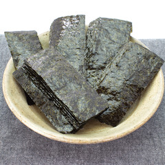 Nori , Japanese edible seaweed . Used chiefly as an ingredient wrap of sushi