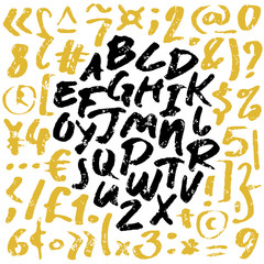 Black and gold letters written with a brush