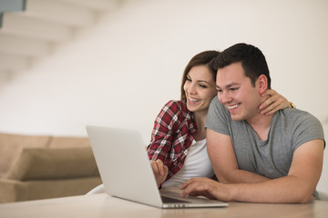 happy young couple buying online