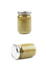 Glass jar of italian pesto isolated