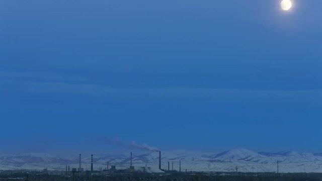 Super moon over the industrial zone.