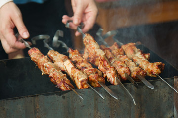 Cooked meat on skewers.