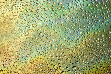 Closeup of water drops on glass surface