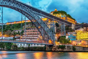 Porto, Portugal: the Dom Luis I Bridge and the Serra do Pilar Monastery on the Vila Nova de Gaia side at sunset
