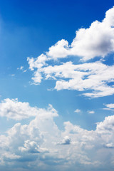 Obraz na płótnie Canvas Soft white clouds against blue sky background and empty space for your design