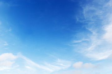Soft white clouds against blue sky background and empty space for your design