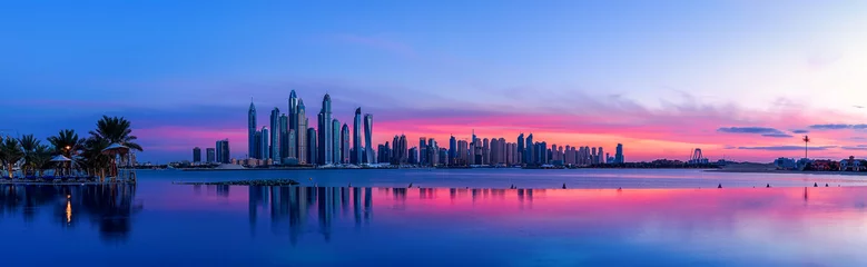 Fotobehang Dubai Stadspanorama van Dubai bij zonsopgang