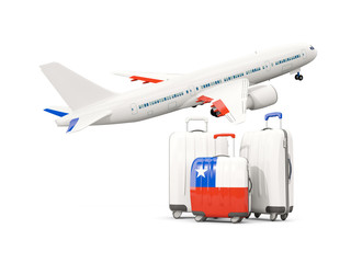 Luggage with flag of chile. Three bags with airplane