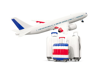 Luggage with flag of costa rica. Three bags with airplane