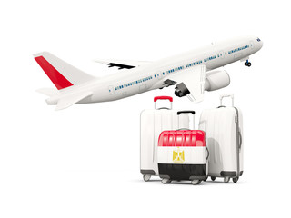 Luggage with flag of egypt. Three bags with airplane