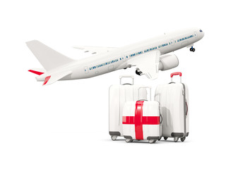 Luggage with flag of england. Three bags with airplane