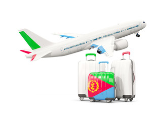 Luggage with flag of eritrea. Three bags with airplane