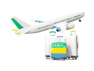 Luggage with flag of gabon. Three bags with airplane