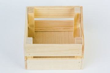 Empty wooden crate isolated on white background.