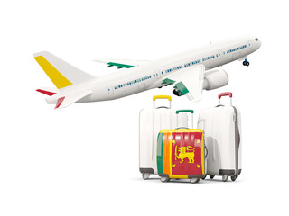 Luggage with flag of sri lanka. Three bags with airplane