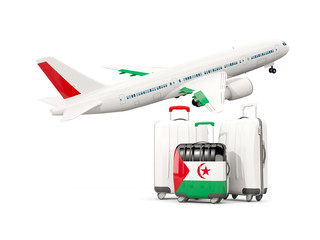 Luggage with flag of western sahara. Three bags with airplane