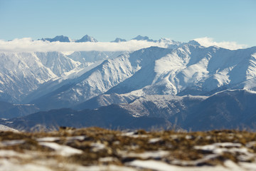 Fototapeta premium The mountain range covered with snow. The Republic of Ingushetia.