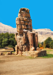 Egypt. Luxor. The Colossi of Memnon - two massive stone statues of Pharaoh Amenhotep III