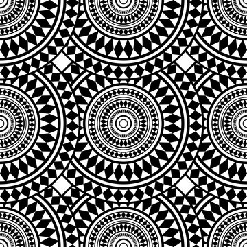 Seamless texture with black and white mandalas