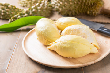 fresh durian on wood dish, king of fruit