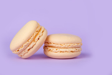 Two sweet orange macaroons
