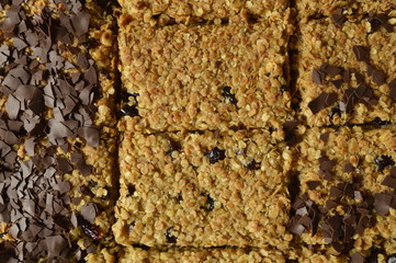 Black and white Flapjack - delicious bar with oatmeal, dried cranberry and dark chocolate