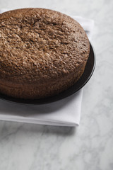 Chocolate cake on marble background