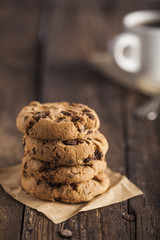 Coffee cup and Cookies on wooden table
