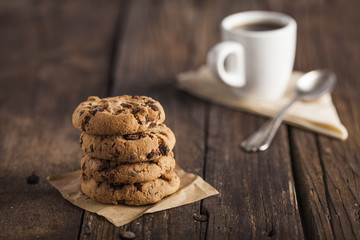 Coffee cup and Cookies on wooden table