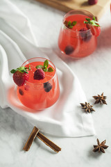 Obraz na płótnie Canvas Strawberry iced drink in a marble table