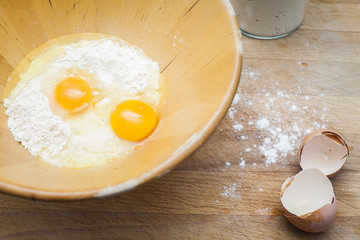 Flour and eggs in a bowl