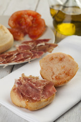 Obraz na płótnie Canvas Pan tumaca. Bread with tomato and jamon serrano with olive oil
