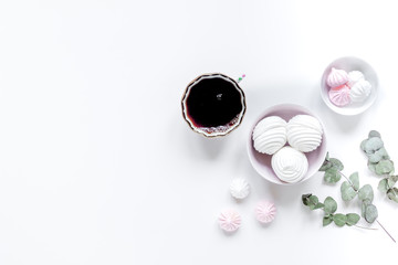 woman lunch with marsh-mallow and flowers soft light on white table background flat lay mockup