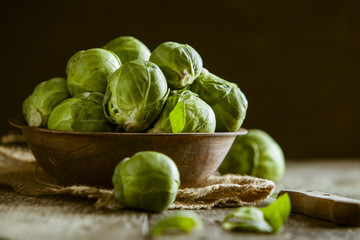 Brussels sprouts on wooden table