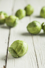 Brussels sprouts on wooden table