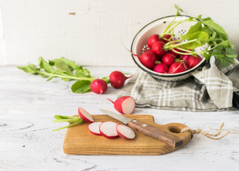 Fresh radishes sliced on the kitchen table
