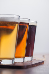     Assorted beers in a flight ready for tasting 