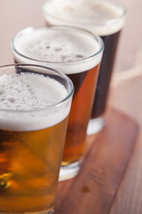     Assorted beers in a flight ready for tasting 