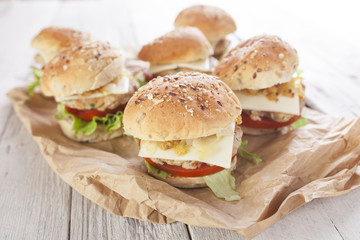 Deluxe gourmet burger on wooden table