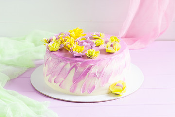 Mousse cake with colorful flowers decoration